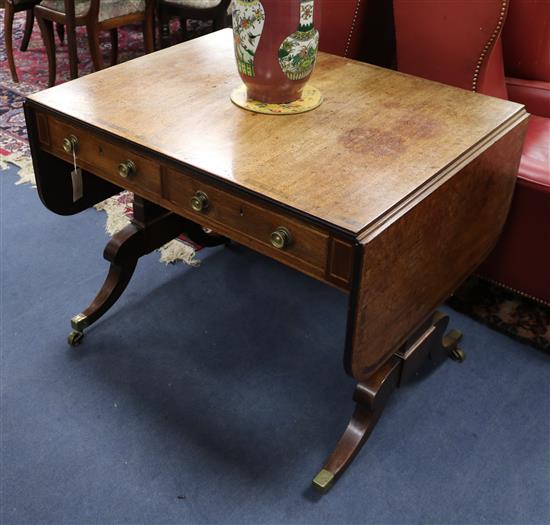 A Regency rosewood banded mahogany sofa table W.90cm